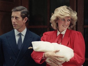 FILE - In this Sept. 16, 1984 file photo, the Prince and Princess of Wales, Prince Charles and Princess Diana leave St. Mary's Hospital in Paddington, London with their new baby son, Prince Harry who was born on Sept. 15. Princess Diana's little boy, the devil-may-care red-haired prince with the charming smile is about to become a father. The arrival of the first child for Prince Harry and his wife Meghan will complete the transformation of Harry from troubled teen to family man, from source of concern to source of national pride. (AP Photo, File)