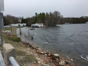 A dock washed away from a cottage on Dalhousie Lake bobs in the waves at the east end of Dalhousie Lake on Saturday, April 27, 2019.