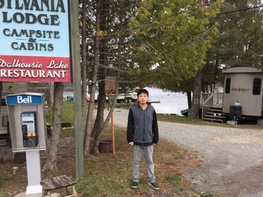 Li Fan Ni — Nico — takes a brief break as water rolls into the Sylvania Lodge resort on the Mississippi River at the east end of Dalhousie Lake on Saturday, April 27, 2019.