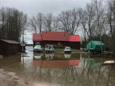 Water surrounds the home of Bill and Lyne Fisher on the north shore of Dalhousie Lake on Saturday, April 27, 2019.