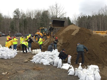 Mountains of sand has arrived at the Constance and Buckhams Bay Community Centre as volunteers continue to fill sandbags.