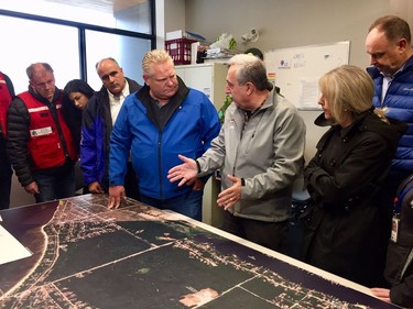 Premier Doug Ford talks to Councillor Eli El- Chantiry about the flooding in Constance Bay.