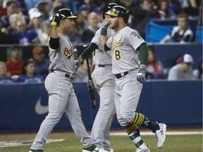 Toronto Blue Jays Billy McKinney RF (8)  hits two-run homer  in eighth inning in Toronto, Ont. on Friday April 26, 2019.