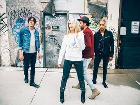 Metric. (l-r) Joules Scott-Key (drums); Emily Haines (vocals); James Shaw (guitar); Joshua Winstead (bass).