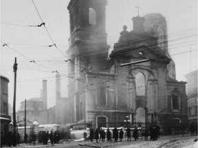 Quebec City residents survey the scorched ruins after fire gutted the Notre-Dame cathedral-basilica in the heart of Old Quebec on Dec. 22, 1922.