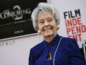 FILE - In this June 7, 2016, file photo, paranormal investigator and film consultant Lorraine Warren poses at the premiere of the film "The Conjuring 2" during the Los Angeles Film Festival at the TCL Chinese Theatre in Los Angeles. Warren, whose decades of ghost-hunting cases alongside her late husband were the inspiration for films such as "The Conjuring" and "The Amityville Horror," died Thursday night, April 18, 2019, at her Connecticut home. She was 92.
