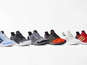 This product image released by HBO shows various styles of Adidas x Game of Thrones Ultra Boosts sneakers inspired by HBO's "Game of Thrones" series. From wine to clothing to tours, HBO and retailers have cashed in throughout the years with "Game of Thrones" merchandise. It is a massive business, with all sides hoping to pad the bank as the show enters its eighth and final season. (HBO via AP)