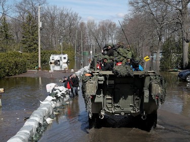 Media traveling with the Canadian Armed Forces during a flooding tour of Constance Bay in Ottawa Tuesday April 30, 2019. Members got a opportunity to watch the Canadian Armed Forces flood relief operations Tuesday.