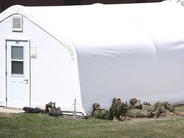 Media traveling with the Canadian Armed Forces during a flooding tour of Constance Bay in Ottawa Tuesday April 30, 2019. Members got a opportunity to watch the Canadian Armed Forces flood relief operations Tuesday. Canadian Armed Forces members during a break back at head quarters Tuesday.