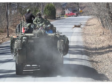 Media traveling with the Canadian Armed Forces during a flooding tour of Constance Bay in Ottawa Tuesday April 30, 2019. Members got a opportunity to watch the Canadian Armed Forces flood relief operations Tuesday.