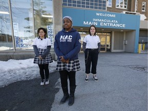 Mackenzie Cubid, Merveille Mvuama and Juliana Brazeau pose for a photo at Immaculata High School in Ottawa Wednesday March 27, 2019. These students are organizing the Immaculata students to join a province-wide student walkout on April 4 to protest the many changes the Doug Ford government is making to education.