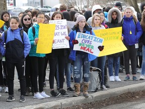 A couple hundred kids walk out of Colonel By High School in Ottawa Wednesday April 4, 2019. Students held a province wide protest against education policies announced by Ontario's Progressive Conservative government. The hour-long protest could involve tens of thousands of Ontario students.