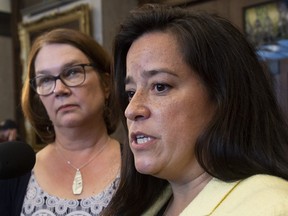 Independent Members of Parliament Jane Philpott and Jody Wilson-Raybould speak with the media before Question Period in the Foyer of the House of Commons in Ottawa, Wednesday April 3, 2019.