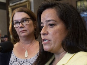 Independent Members of Parliament Jane Philpott and Jody Wilson-Raybould speak with the media before Question Period in the Foyer of the House of Commons in Ottawa, Wednesday April 3, 2019.