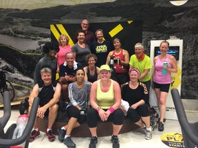 After a devastating accident, Michelle Earle (in red top at back) began her path to recovery in The Rehabilitation Centre of The Ottawa Hospital. She has now returned to her full-time job and also teaches spin classes twice a week.
