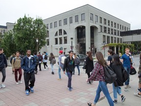 Students at the University of Ottawa: There are several ways the city can be more youth-friendly.   
 (Photo Wayne Cuddington/ Postmedia)