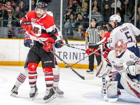 Ottawa 67's forward Austen Keating (9) prepares to jump out of the way of a shot on net against the Oshawa Generals' netminder Kyle Keyser, right,  during an Ontario Hockey League Eastern Conference final playoff gameat TD Place arena on Saturday, April 20, 2019. Ottawa won the game 7-4 to take a 2-0 lead in the best-of-seven series.