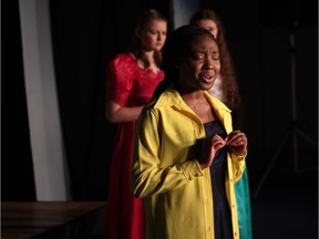 Gabriella Brinkman (R), performs as Gloriana the Twelfth, Tobi Mohammed (M), performs as Countess Mountjoy, Christy Bailey (L), performs as Davida Benter, during Redeemer Christian High School's Cappies production of The Mouse that Roared, on April 26, 2019.