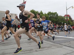 Runners take part in the 5k run at the Ottawa Race Weekend on Saturday, May 25, 2019.