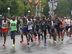 Runners leave the start line of the marathon at the Ottawa Race Weekend on Sunday, May 26, 2019.