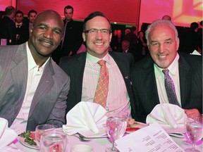 Ringside for Youth's Steve Gallant with special guest Evander "The Real Deal" Holyfield, left, and event ambassador Gerry Cooney, right, in May 2012.