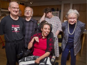 November 12, 2012 -- The five core members of the home are Randy (clockwise from left), Jim, Margaret, Dorothy and Chastity (in the chair).  L'Arche is a series off homes for people with mental disabilities. Their assistants live with them around the clock so each home has a stable, family-like environment, rather than a group home.