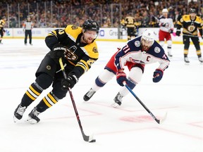 Joakim Nordstrom of the Boston Bruins skates against Nick Foligno of the Columbus Blue Jackets during the first period of Game Five of the Eastern Conference Second Round during the 2019 NHL Stanley Cup Playoffs at TD Garden on Saturday in Boston, Massachusetts.