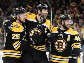 Zdeno Chara, centre, seen celebrating during Game 1 against Carolina, was one of four Boston Bruins who were a part of the 2010 team that blew a seemingly insurmountable 3-0 lead to the Philadelphia Flyers in the conference semifinals.