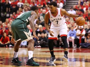 TORONTO, ONTARIO - MAY 21: Kyle Lowry #7 of the Toronto Raptors handles the ball during the second half against the Milwaukee Bucks in game four of the NBA Eastern Conference Finals at Scotiabank Arena on May 21, 2019 in Toronto, Canada. NOTE TO USER: User expressly acknowledges and agrees that, by downloading and or using this photograph, User is consenting to the terms and conditions of the Getty Images License Agreement.