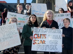 Grade 8 student Amy Unhola, 14, right, was one of the organizers of the Wednesday's demonstration on Parliament Hill to protest against the Ontariuo government's cuts in education.