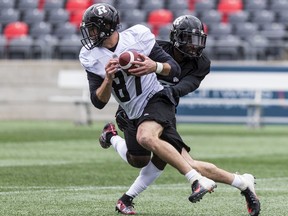 WR Seth Coate makes a catch and eludes a tackle during Ottawa Redblacks Rookie Camp at TD Place on May 15, 2019.