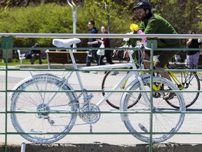 A ghost bike has been installed at Ottawa City Hall, not far from where a cyclist was struck in a hit-and-run late last week. May 21, 2019.