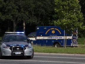 An ambulance turns on Nimmo Parkway following a shooting at the Virginia Beach Municipal Center on Friday, May 31, 2019, in Virginia Beach, Va. At least one shooter wounded multiple people at a municipal center in Virginia Beach on Friday, according to police, who said a suspect has been taken into custody.