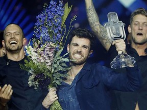 TOPSHOT - Netherlands' Duncan Laurence celebrates after winning the 64th edition of the Eurovision Song Contest 2019 at Expo Tel Aviv on May 19, 2019, in the Israeli coastal city.
