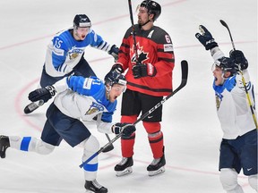 Finland's players celebrate scoring during the IIHF Men's Ice Hockey World Championships final between Canada and Finland on May 26, 2019 in Bratislava.