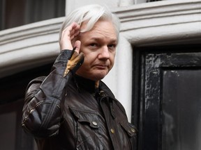 In this file photo taken on May 19, 2017 Wikileaks founder Julian Assange speaks on the balcony of the Embassy of Ecuador in London on May 19, 2017. - Julian Assange has been subjected to drawn-out "psychological torture", a UN rights expert said May 31, 2019, accusing the United States, Britain, Ecuador and Sweden of "collective persecution" of the WikiLeaks founder. The United Nations special rapporteur on torture and other cruel, inhuman or degrading treatment, Nils Melzer, also warned that if London agrees to an extradition request from Washington, Assange risked the death penalty.