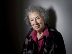 FILE - In this June 9, 2015 file photo, author Margaret Atwood poses to promote her novel, "The Heart Goes Last" in Toronto.