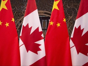 Flags of Canada and China are seen prior to a meeting of Canadian Prime Minister Justin Trudeau and Chinese President Xi Jinping at the Diaoyutai State Guesthouse in Beijing on Dec. 5, 2017.