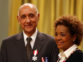 Former Ottawa Citizen opinion editor and columnist Mohammed Azhar Ali Khan became a Member of the Order of Canada in 2009. He is shown here with then-governor general Michaēlle Jean.