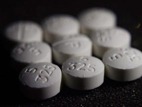 Statistics Canada has released data showing life expectancy stopped increasing for the first time in four decades as young men and women died at higher rates, mostly due to opioid-related overdoses in British Columbia, followed by Alberta. An arrangement of pills of the opioid oxycodone-acetaminophen are shown in New York, Aug.15, 2017.
