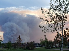 Smoke column can be seen from the Town of High Level, the evening of Tuesday May 21, 2019.