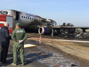 Investigators at a site of the crash of a Russian-made Superjet-100 at Sheremetyevo airport outside Moscow on May 6, 2019.