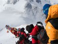 Files: A line of climbers attempted to reach the summit of Mount Everest in 2019