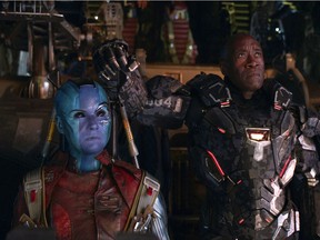 Karen Gillan, left, and Don Cheadle in a scene from "Avengers: Endgame." They struggle to save us all; I struggle to stay awake. (Disney/Marvel Studios via AP)