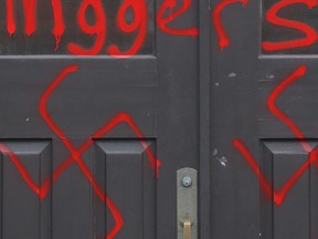 File photo of part of some hate graffiti sprayed on a church  in Ottawa.