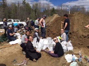 Students from Holy Trinity High School took a field trip to Constance Bay on April 30 to help with the flood relief by sandbagging.