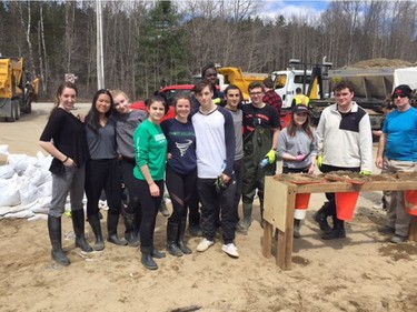 Students from Holy Trinity High School took a field trip to Constance Bay on April 30 to help with the flood relief by sandbagging.
Credit: Tiffany Wheatley, Holy Trinity High School