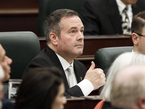 Alberta Premier Jason Kenney gives the thumbs up as the speech from the throne is delivered in Edmonton on May 21, 2019.