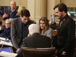 Collins-Bayridge Coun. Lisa Osanic, centre, plans to ask city council to authorize the formation of a working group to help residents make changes in their own lives to help address climate change in Kingston, Ont. on Tuesday, Jan. 30, 2019. Elliot Ferguson/The Whig-Standard/Postmedia Network