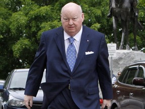 Mike Duffy makes his way to the Senate on Parliament Hill, Tuesday, May 28, 2013 in Ottawa.